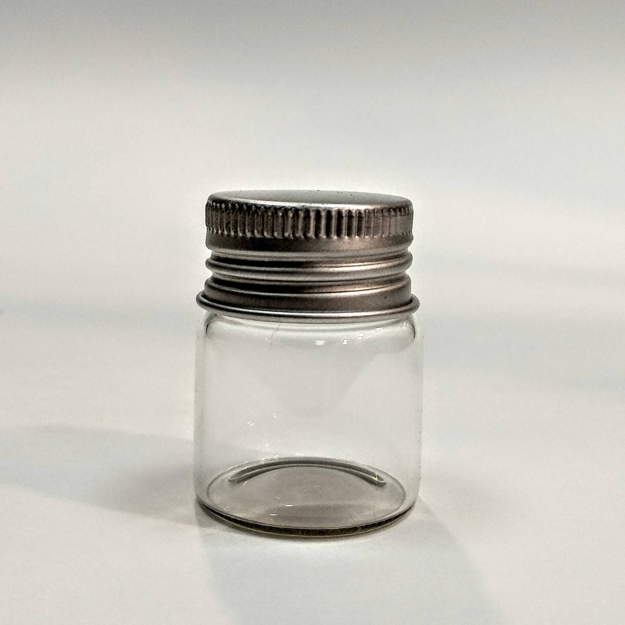 

Баночка стеклянная с ЗАВИНЧ. пробкой ПРОЗРАЧНАЯ 10мл (27х35мм)