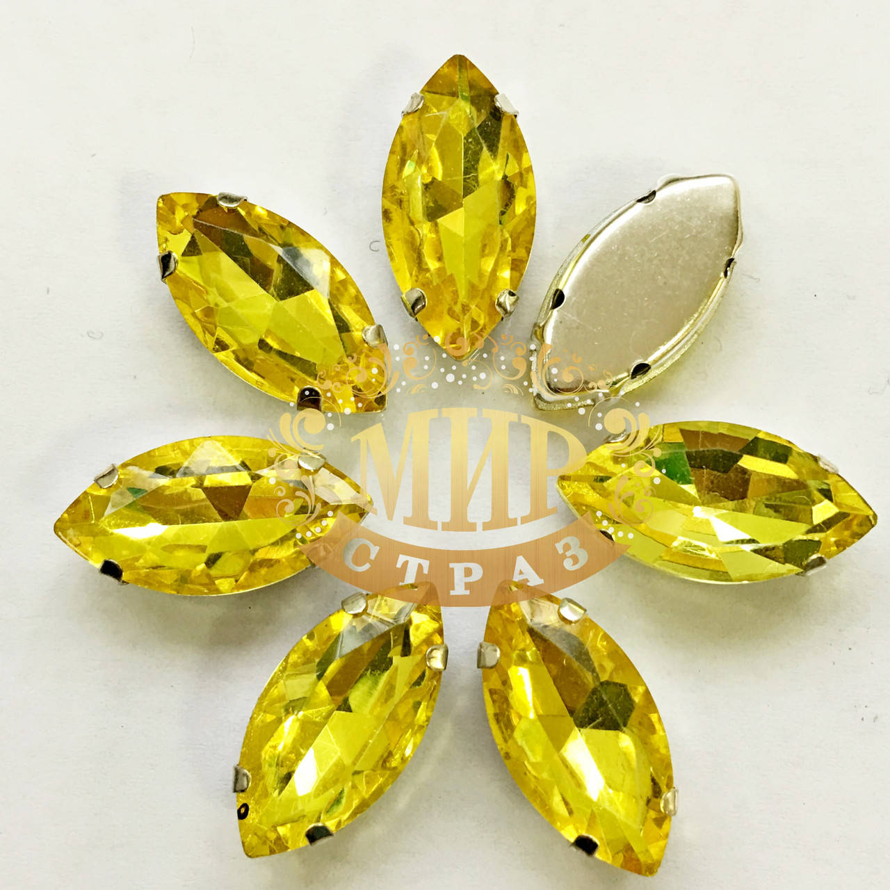 

Cтразы в цапах 7*15мм Цвет Citrine
