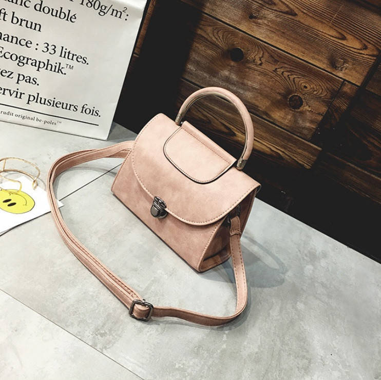 

Женская мини сумка Розовый