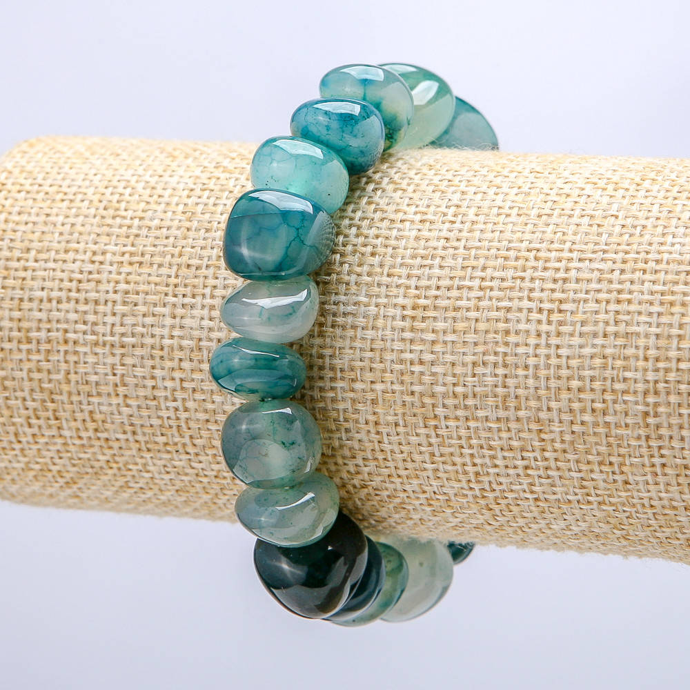 

Браслет на резинке из натурального камня Агат галтовка d-12х14мм+-, обхват-18см +-