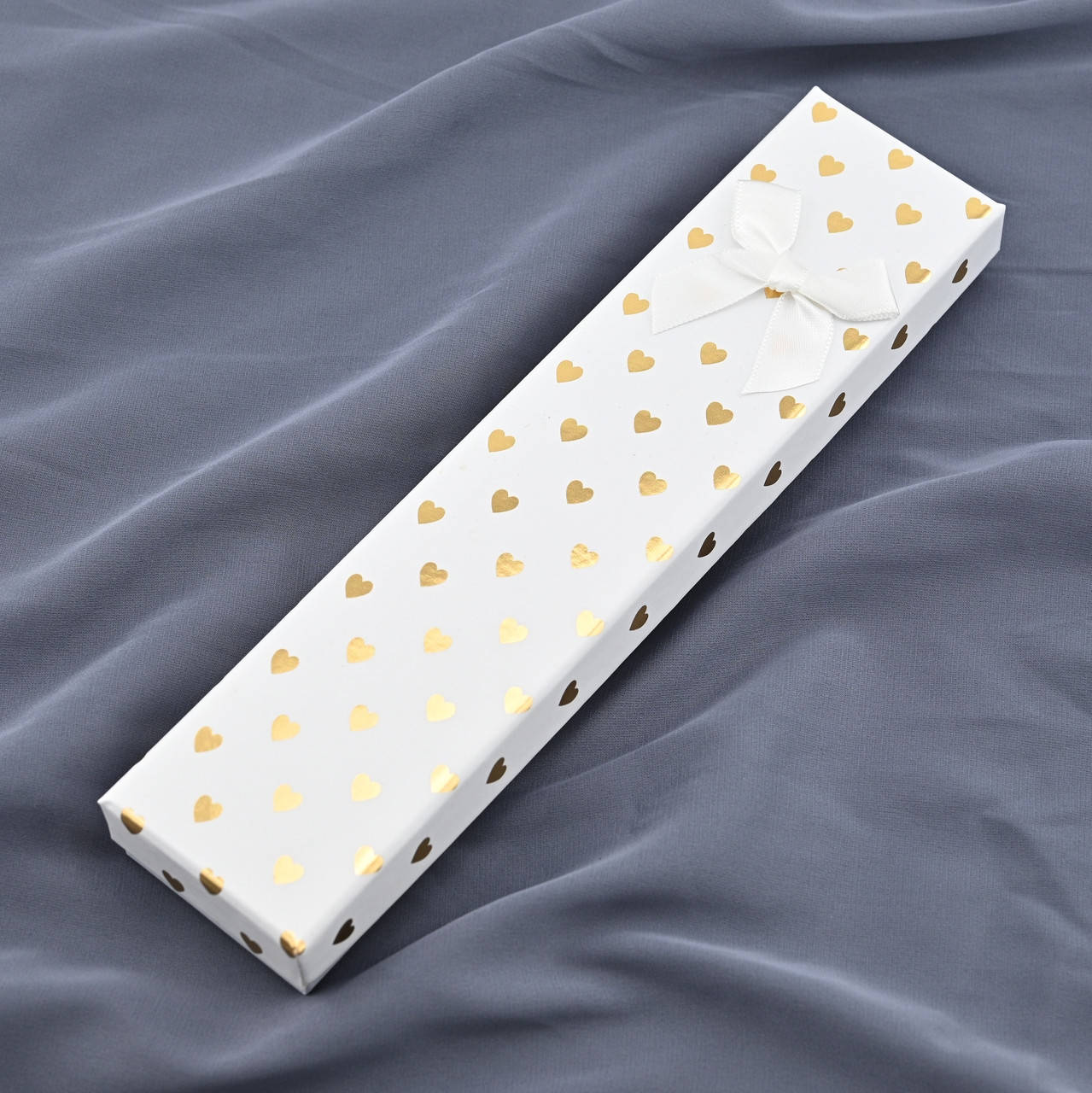 

Футляр 37707 белый для цепочек браслетов размер 21х4 см