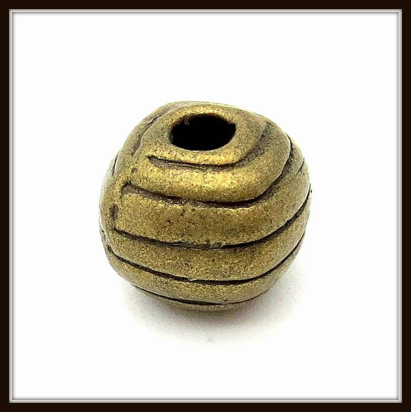 

Металл. бусина "круглая" бронза (d 0,7 х h 0,6 см) 20 шт в уп.