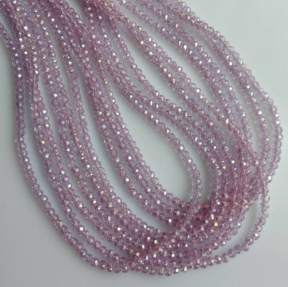 

Бусины стекло прозрачное светло сиреневый с напылением "рондель" d-3,5х2,5мм нитка L-37см