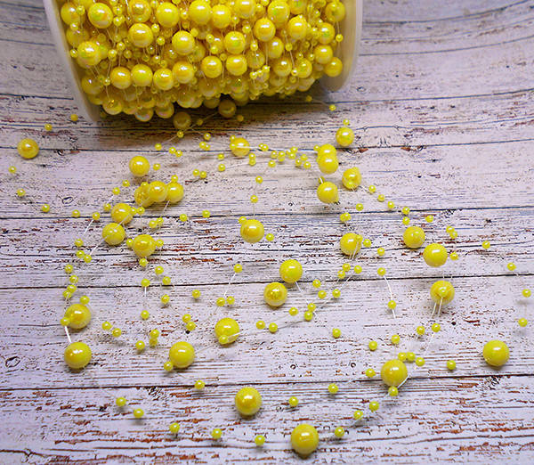 

Буси 3-8 мм на леске № 20 жовті перламутрові