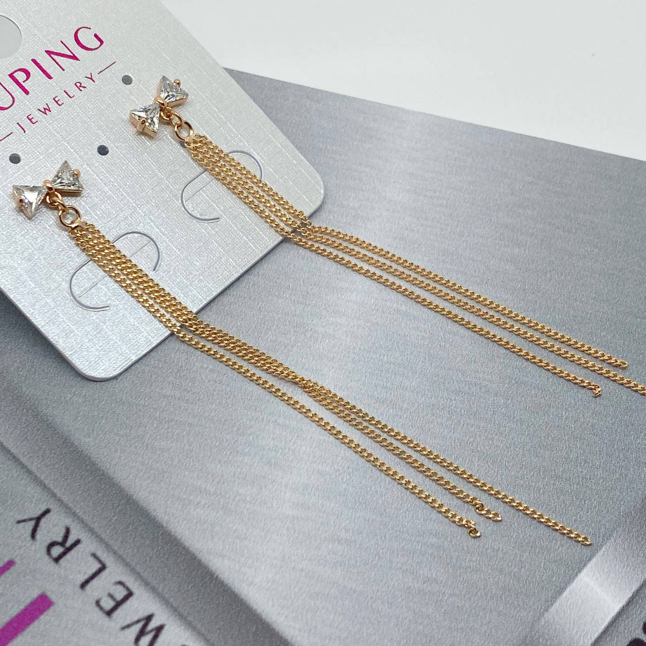 

Длинные серьги с бантиками xp