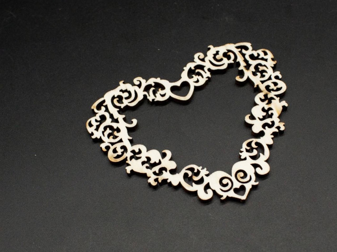 

Деревянные заготовки из фанеры. Сердце. Узор. 9х10 см