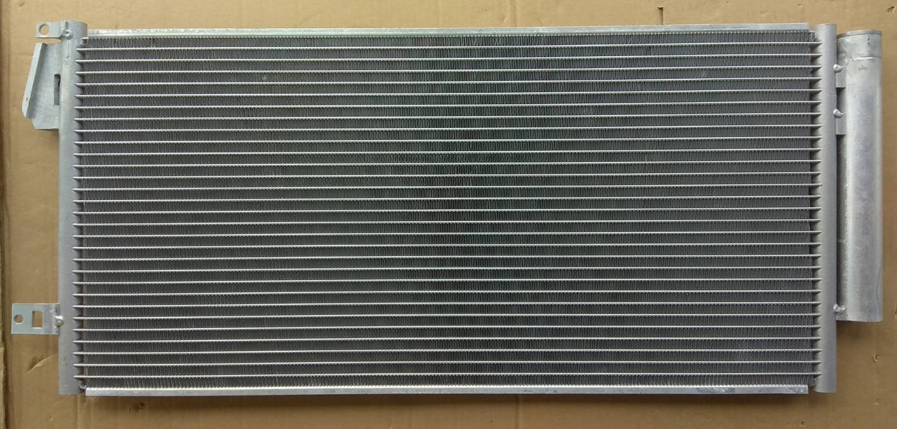 

Радиатор кондиционера Fiat Doblo 10-> Opel Combo 12->669*393 (с осушителем)
