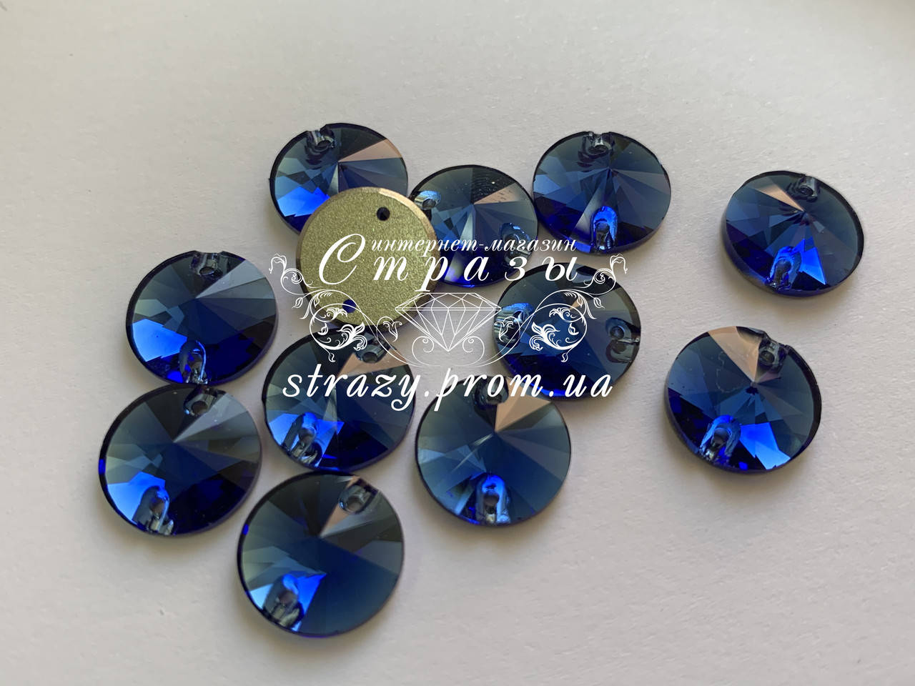 

Стразы пришивные SWARO Круги 12мм. Sapphire