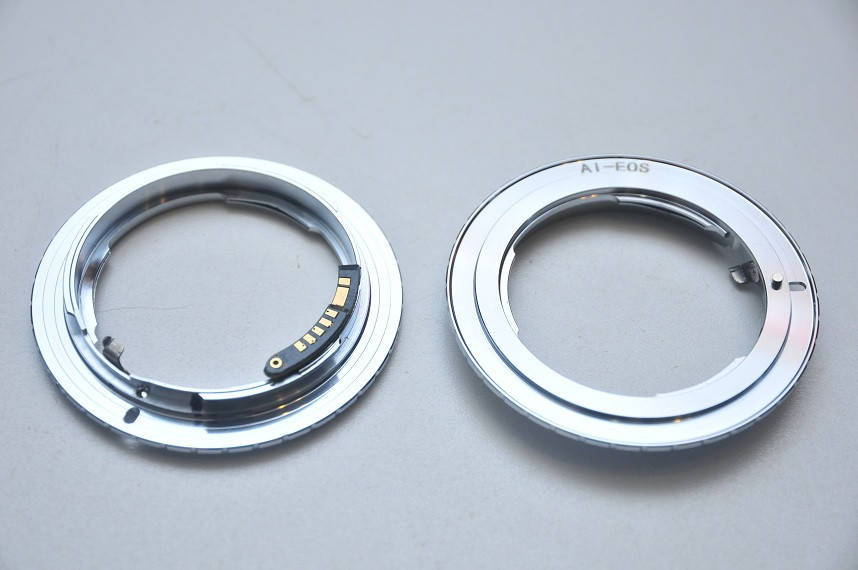 

Nikon - Canon адаптер с чипом фокусировки Никон Ai Ais F Кенон EOS EF