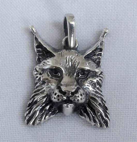 

Голова Рыси с чернением славянский оберег из серебра 925-ой пробы