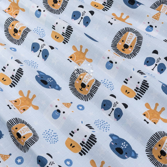 

Муслин в квадратики "Мордашки животных" на голубом фоне, ширина 160 см, Голубой