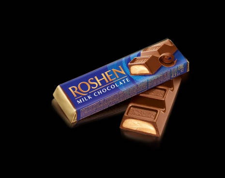 

Батон молочно-шоколадний з начинкою крем-брюле Рошен Roshen