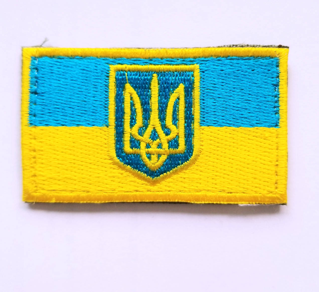 

Шеврон / нашивка "ПРАПОР УКРАЇНИ З ТРИЗУБОМ" (жовто-блакитний)