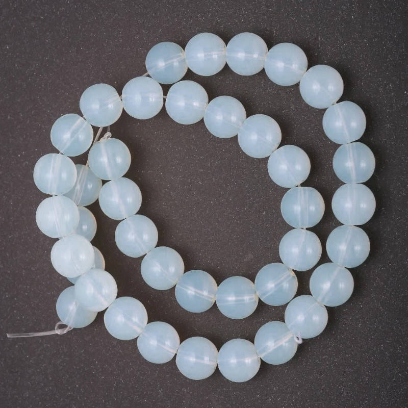 

Бусины Лунный камень им. гладкий шарик d-10мм нитка L-38 см