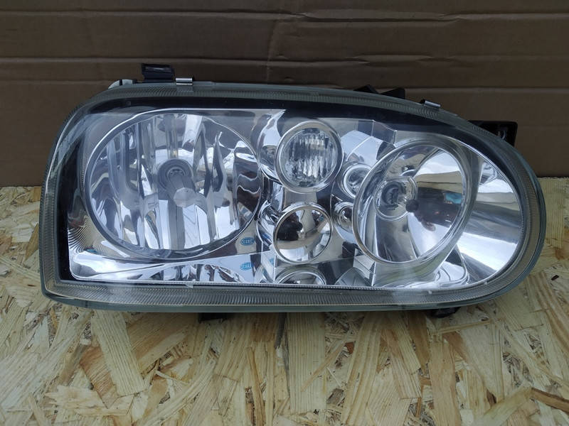 

Фара правая Volkswagen Golf III 1991-1999 Hella 13917400R; 139174-00R