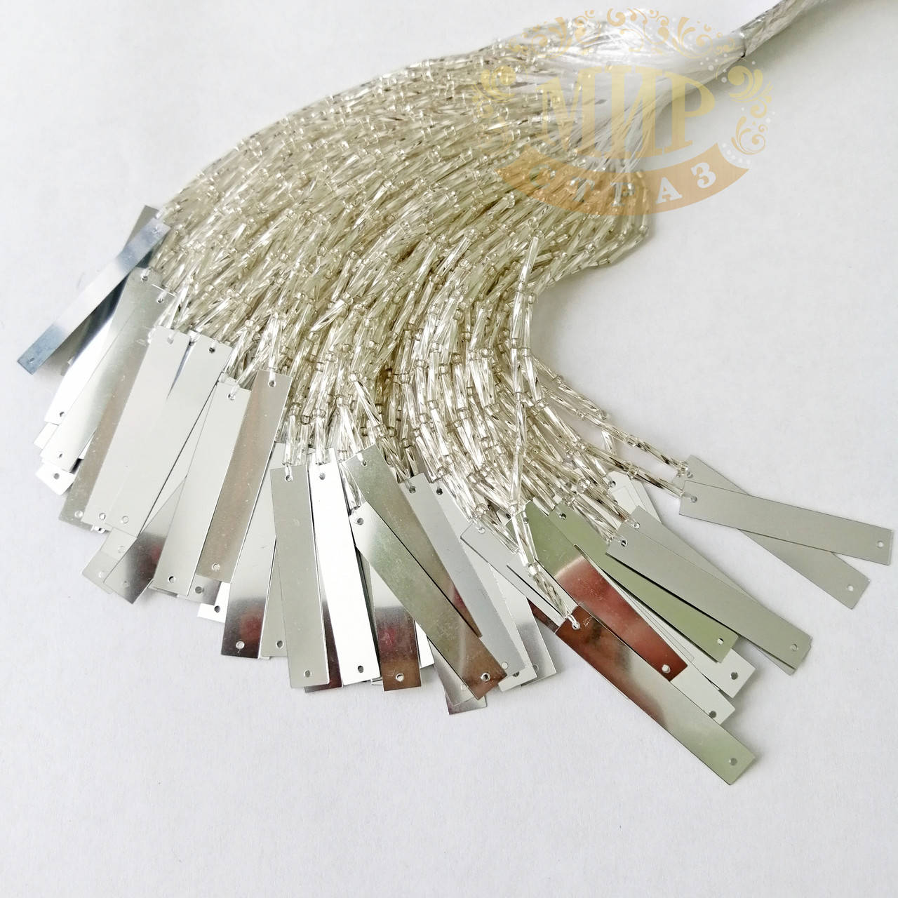 

Стеклярусные нити с прямоугольной пайеткой, цвет Silver, длинна 10см (10штук)