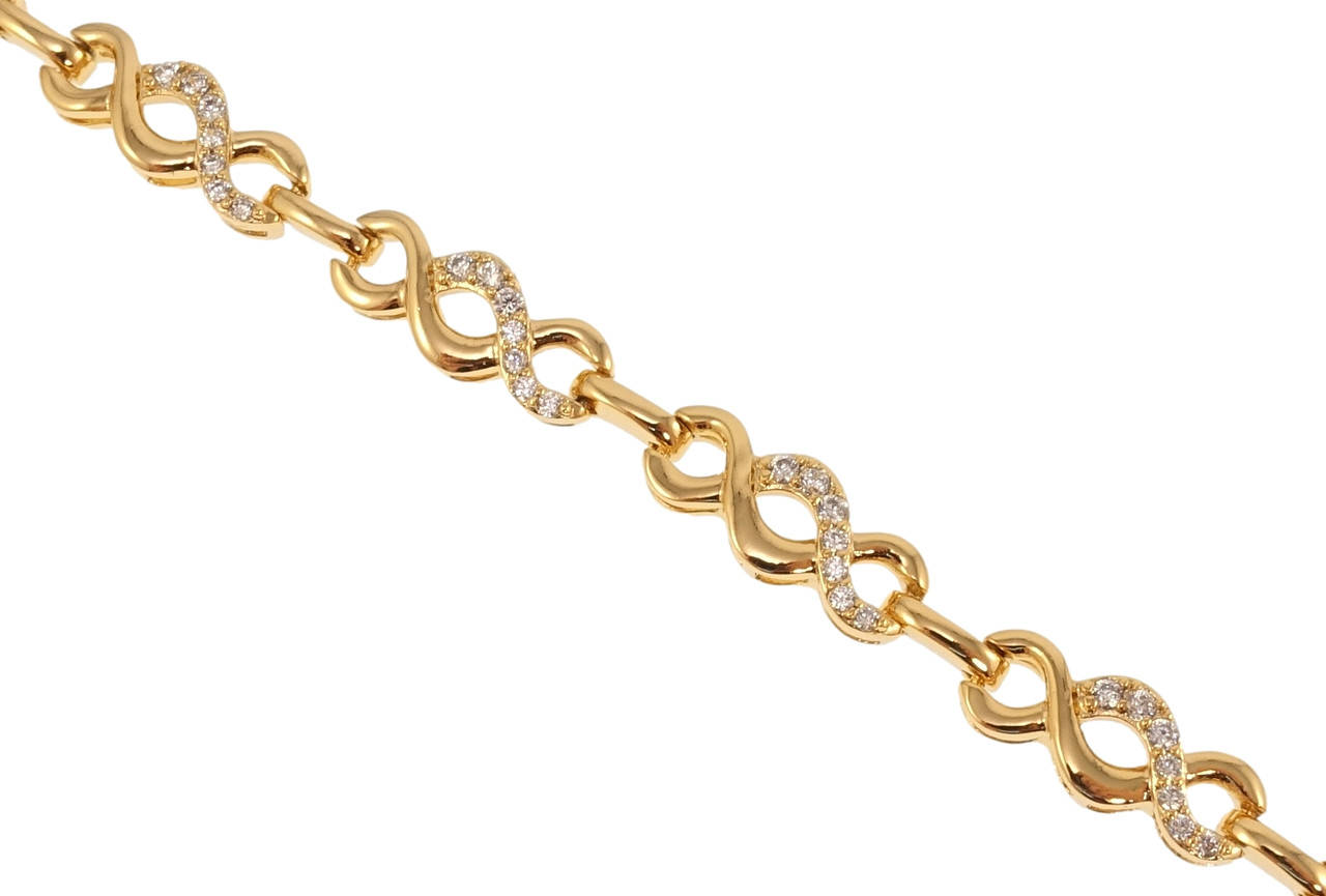 

Браслет Xuping Позолота 18K "Бескрайность" длина с доп.замком 17,19см х 5-6мм