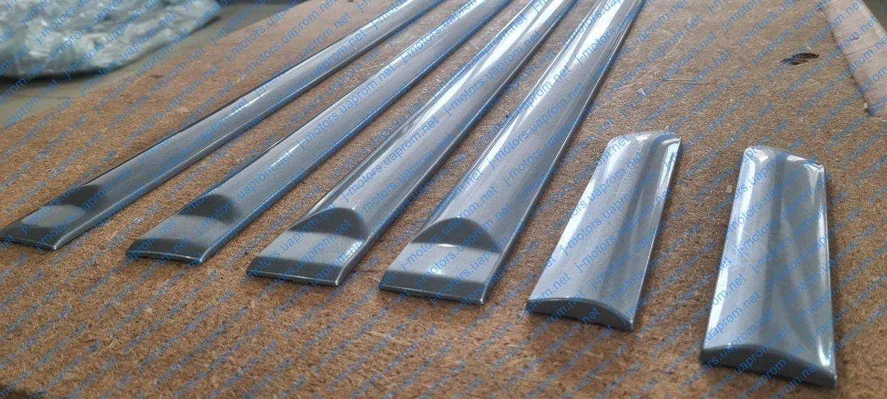 

Комплект молдингов на двери и крылья Daewoo Nexia Деу Нексия. Крашеные в цвет серо-голубой!