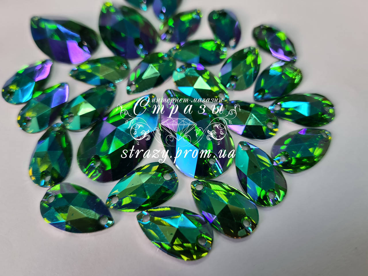 

Стразы пришивные Капля 7*12мм. Акрил Emerald AB
