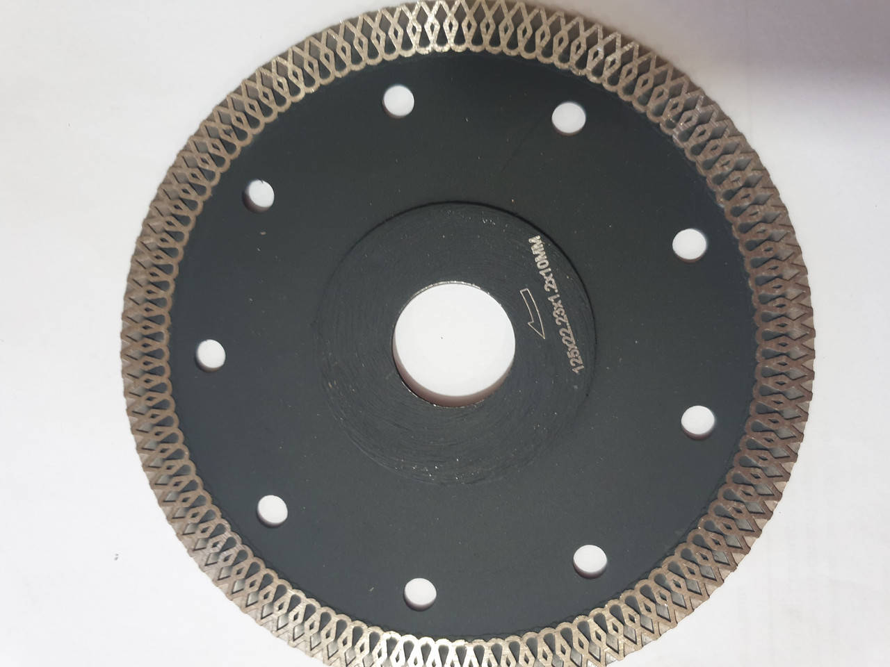 

Диск ультра тонкий по керамограниту,гранииту, мрамор 125 диаметр для болгарки