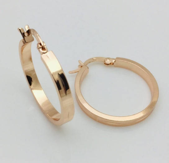 

Серьги кольца Fallon высота 25 мм ширина 3 мм, позолота 18К