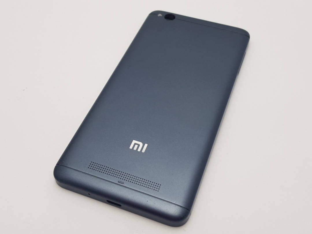 

С дефектом. Задняя крышка Xiaomi Redmi 4A серая Сервисный оригинал с разборки, Серый