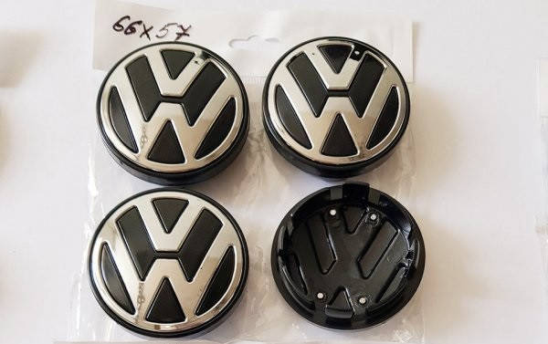 

Колпачки пластиковые на титаны Volkswagen черный, 65/57 мм