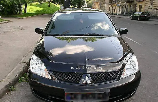 

Дефлектор капота на Mitsubishi Lancer IX седан/универсал 2003-2007 .Мухобойка на Mitsubishi Lancer 9
