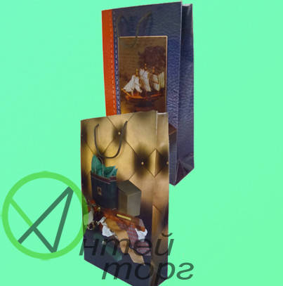 

Паперові пакети подарункові Чоловічі прямокутні 42*26см.