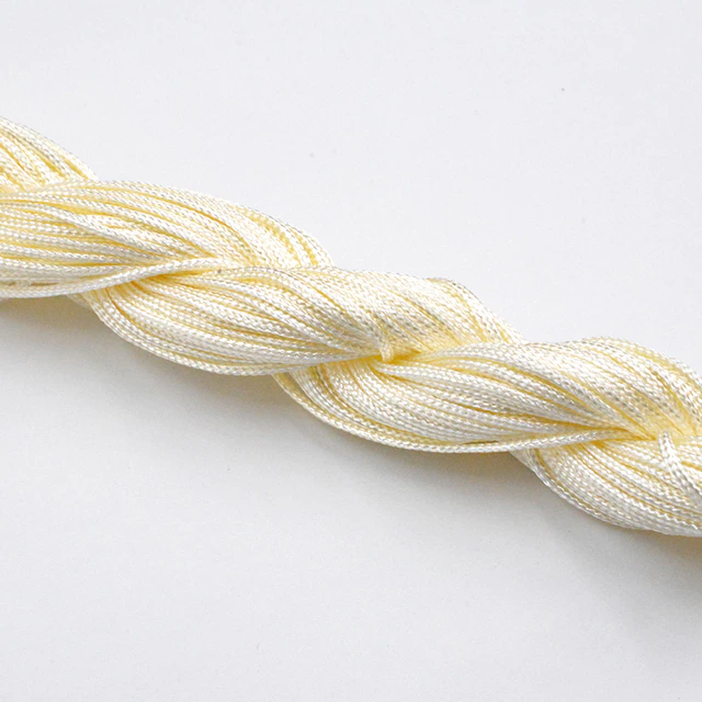 

Шнур капроновый для плетения шамбалы - молочный