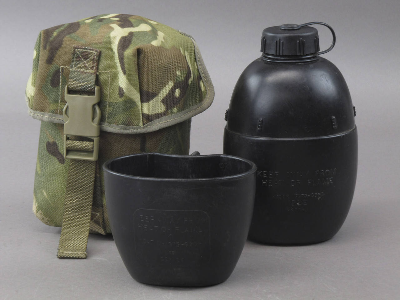 

Фляга M58 (1L) с кружкой в чехле MTP. Великобритания, оригинал.