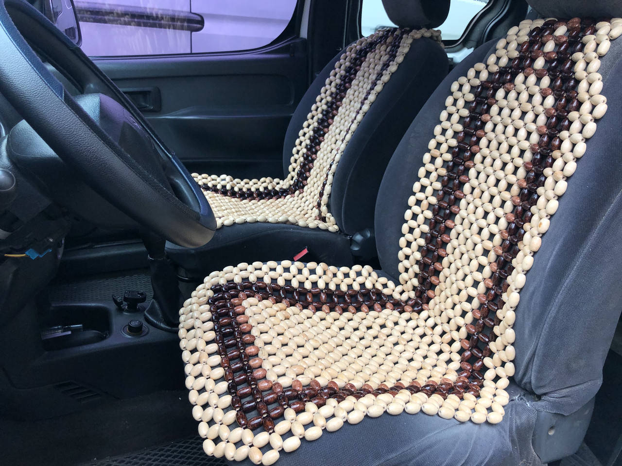 

Деревянная автомассажная накидка на сиденье автомобиля.