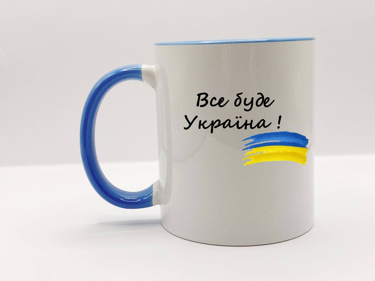 

Кружка Все будет Украина Белая с синей ручкой