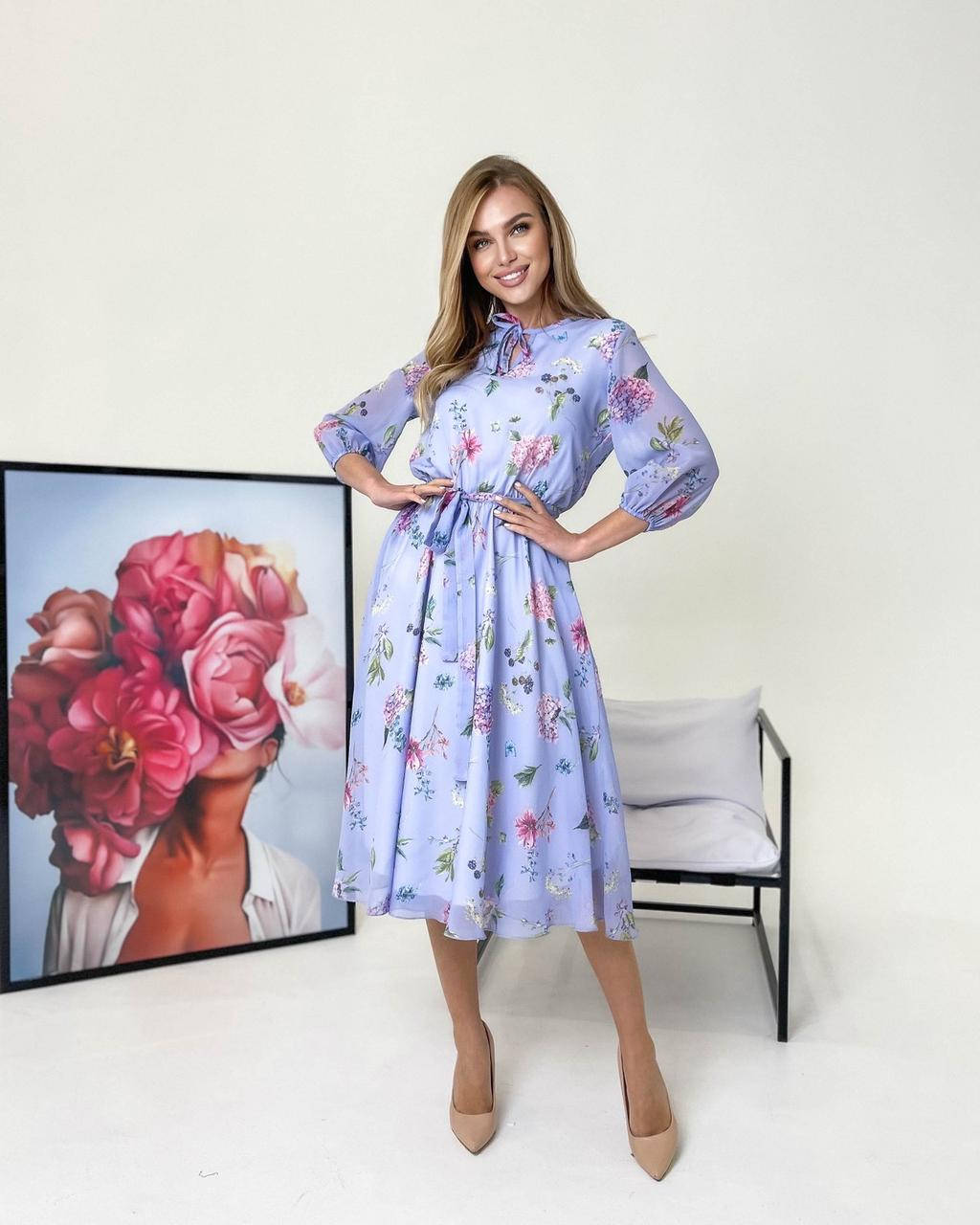

Шифоновое платье миди с цветочным принтом. Размеры с 44 по 50. Голубого цвета