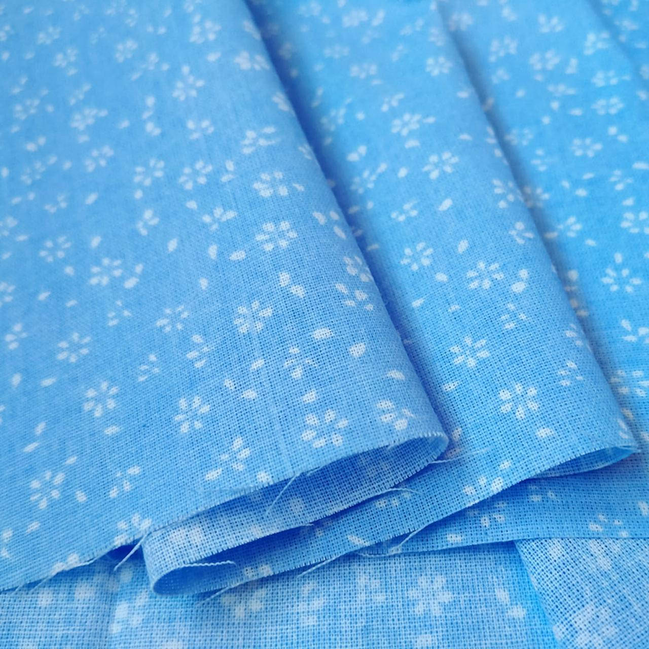 

Ткань хлопок мелкие цветочки на голубом