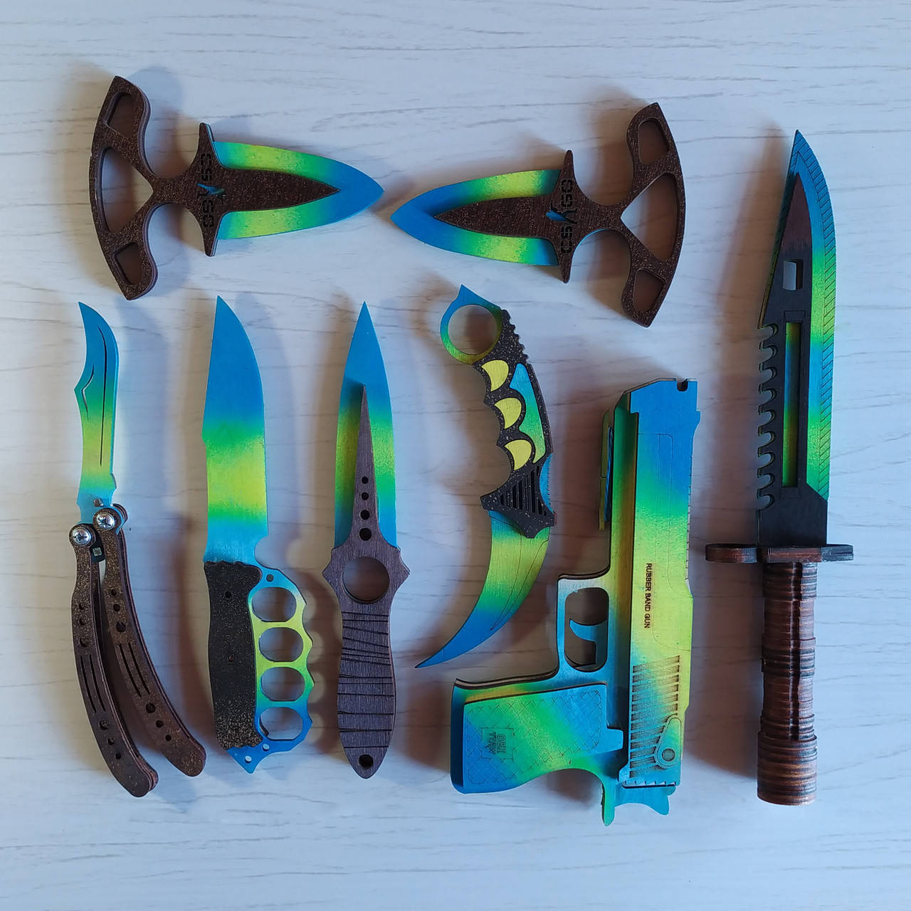 

Набор деревянного оружия из игры CS:GO 8шт. Бабочка Кастет Штык Нож Керамбит Тычковые Пистолет Скелетный., Синий