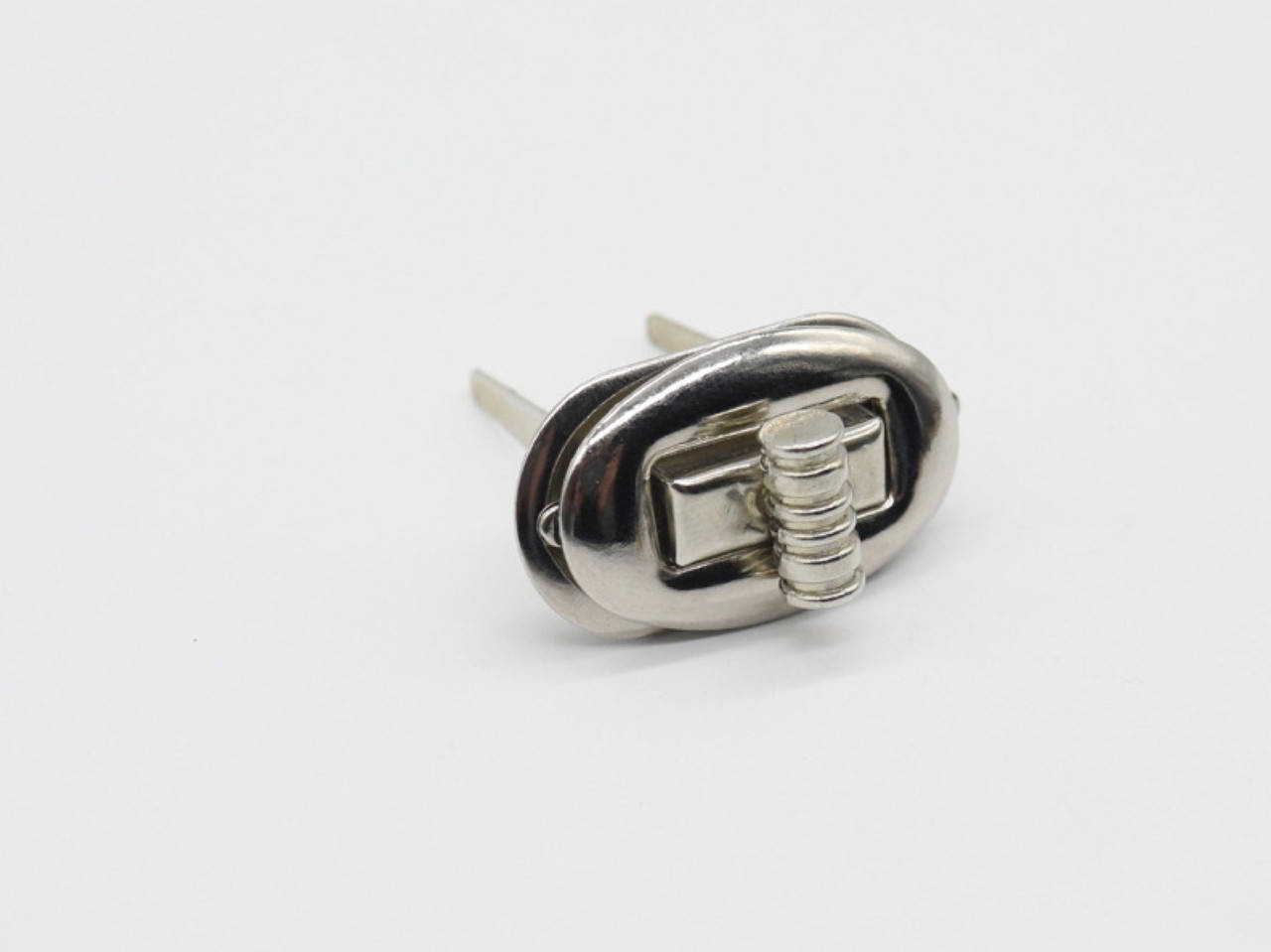 

Замок для сумок. 25х16мм, Серебро