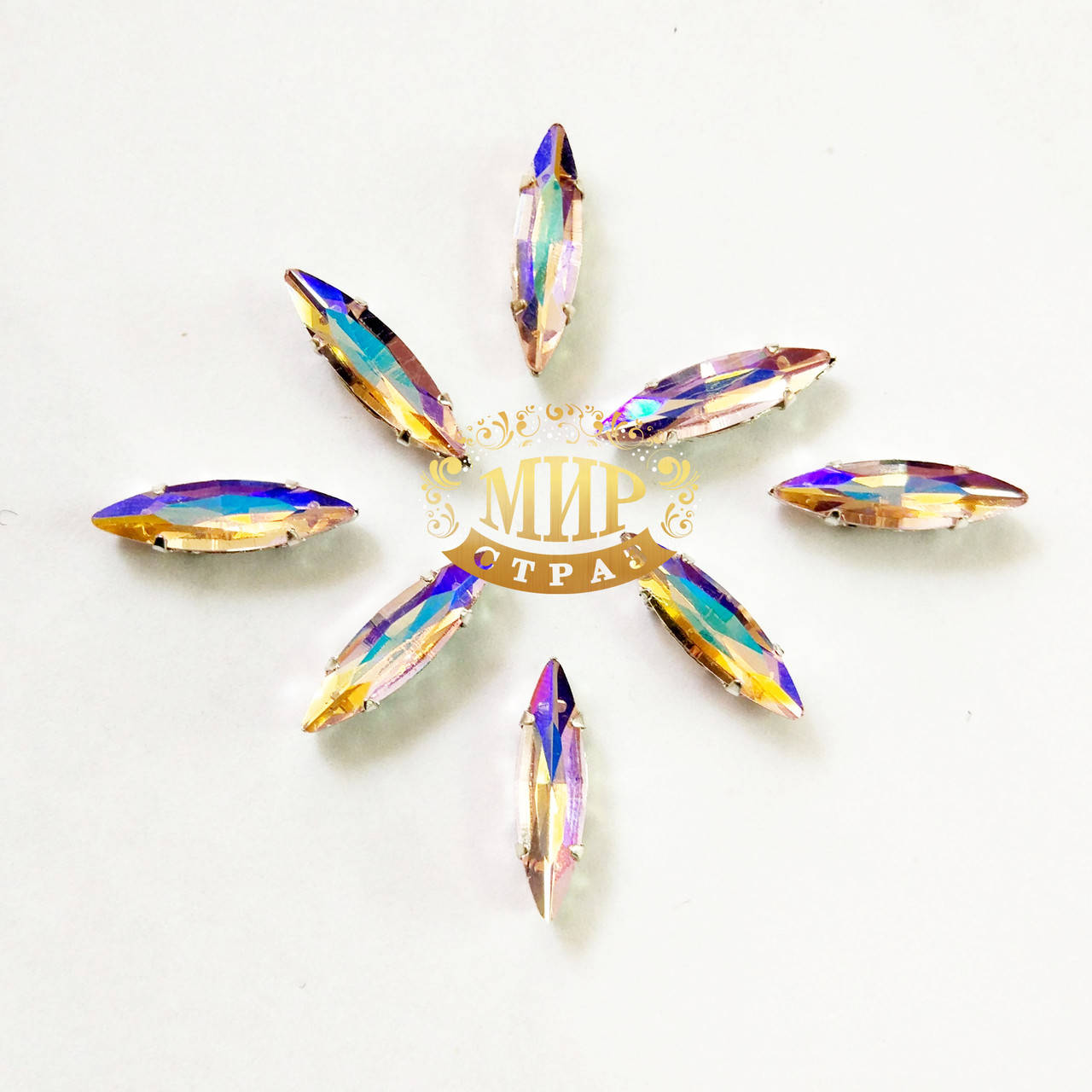 

Cтразы в цапах.Иголочка 4х15мм.Цвет Lt.Rose AB, Белый