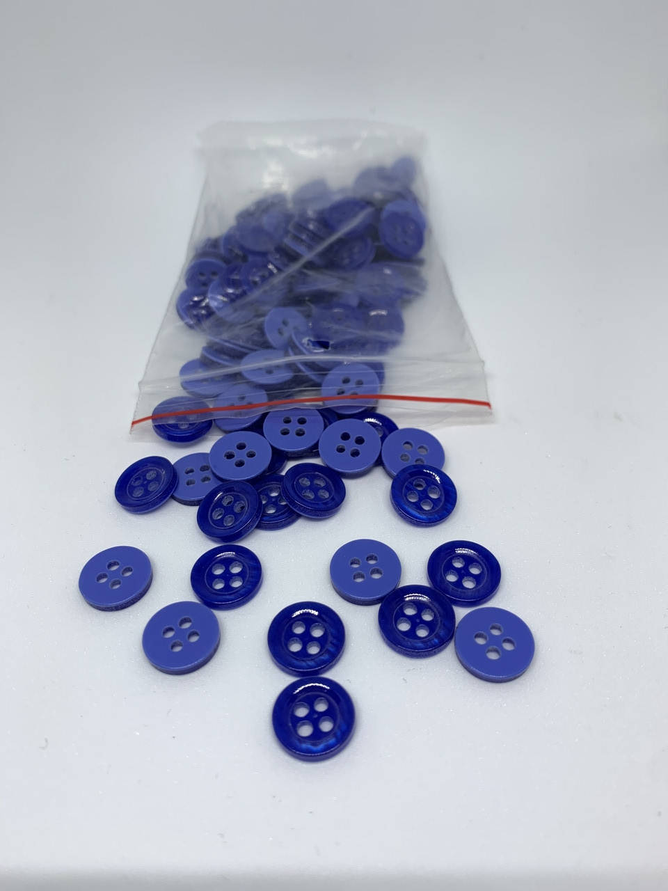 

Пуговица рубашечная на 4 отверстия 12мм/100шт №40