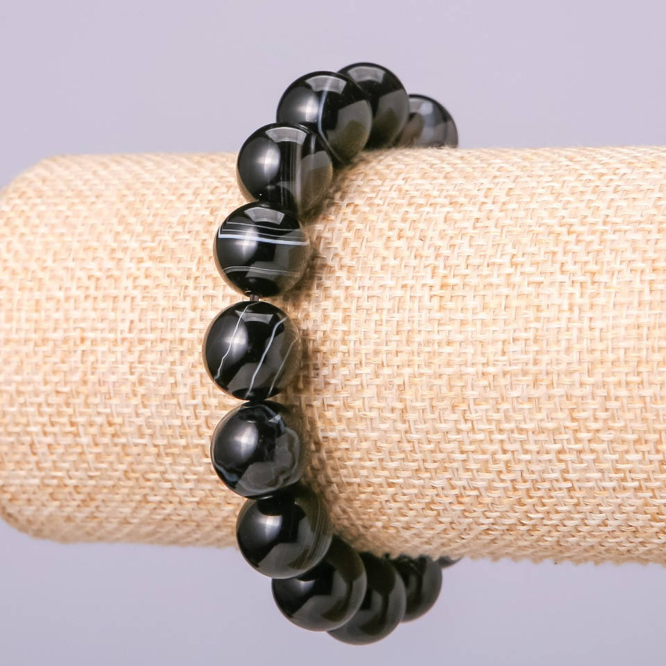 

Браслет из натурального камня Агат гладкий шарик d-12мм обхват 18см на резинке