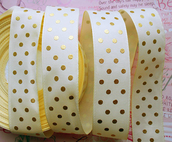 

Стрічка репсова 25мм молочна в золотий горошок №27