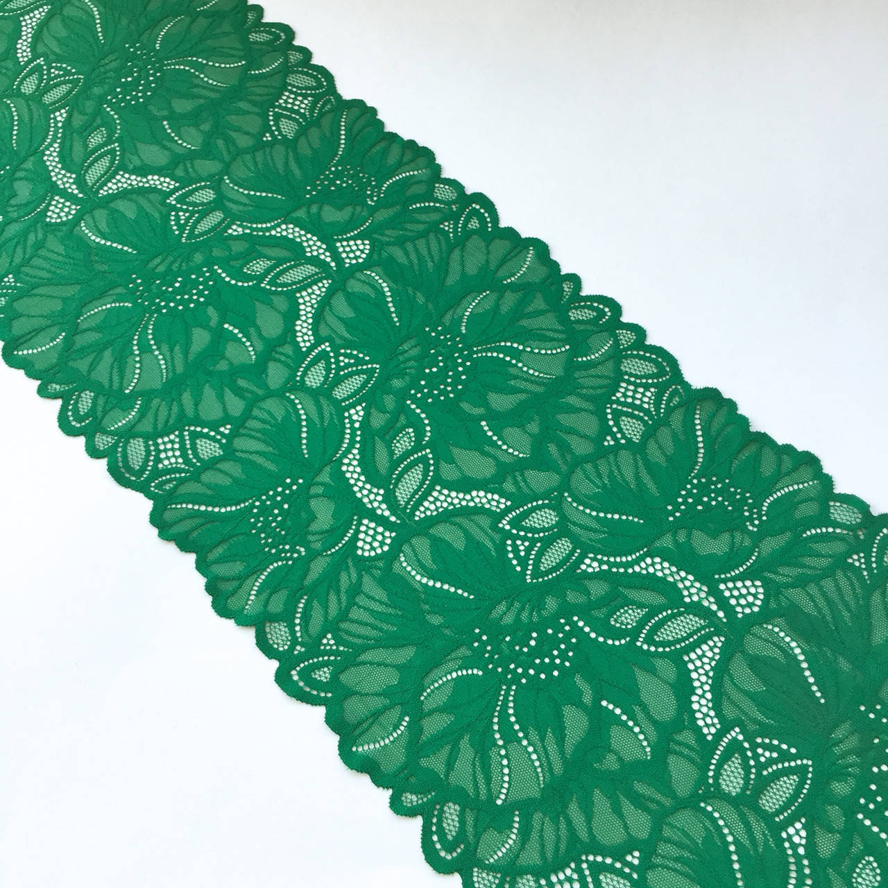 

Стрейчевое (эластичное) кружево зеленого цвета шириной 21,5 см., Зелёный