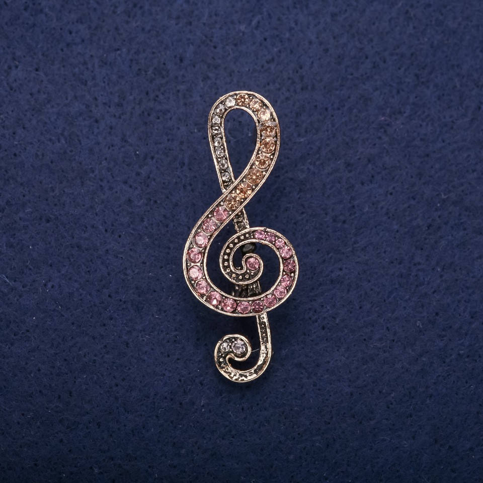 

Брошь музыка Скрипичный ключ желтые стразы 46х18мм серебристый металл