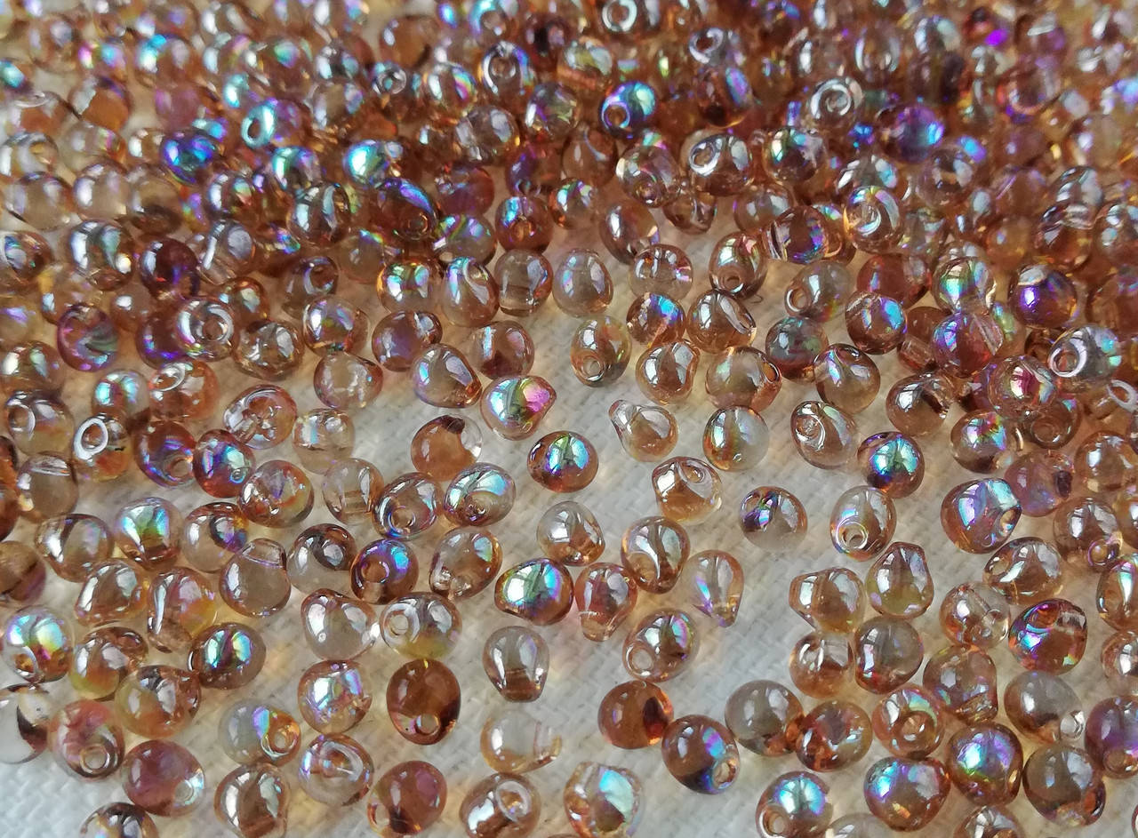 

Miyuki Drops 3,4 mm Crystal Brown Rainbow 5 г.