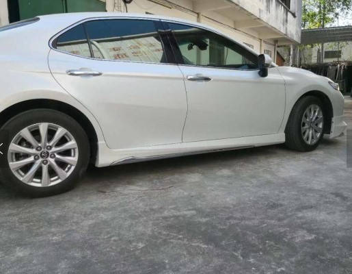 

Накладки на боковые пороги Toyota Camry 70 2018+ г.в. в стиле Modellista