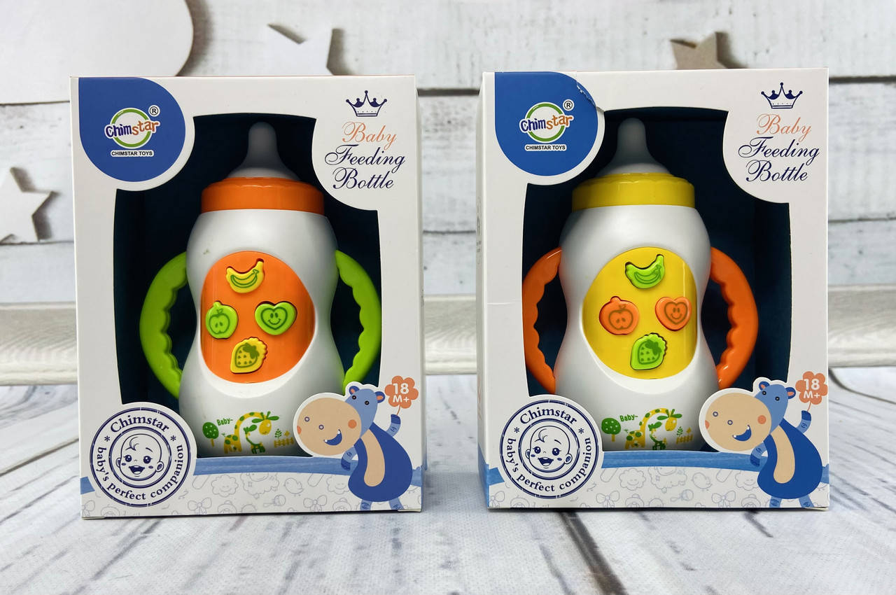 

Музыкальная игрушка для самых маленьких. Музыкальная Бутылочка В коробке QF366-004