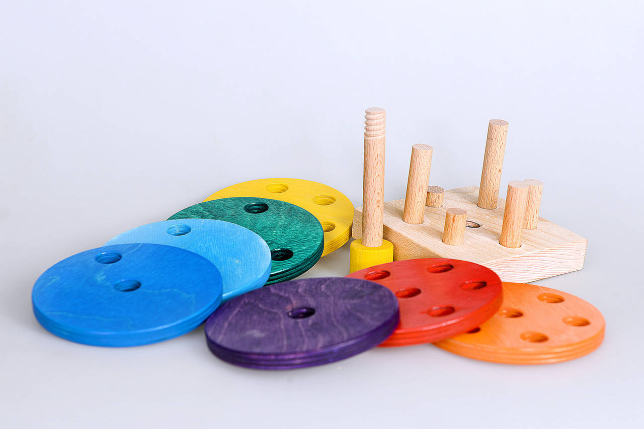 

Деревянная игрушка пирамидка "Ребус"