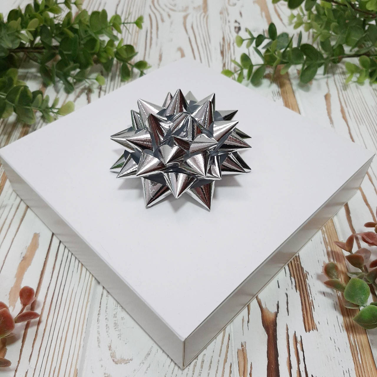 

Декор "Зірка" срібна металізована 9 см.