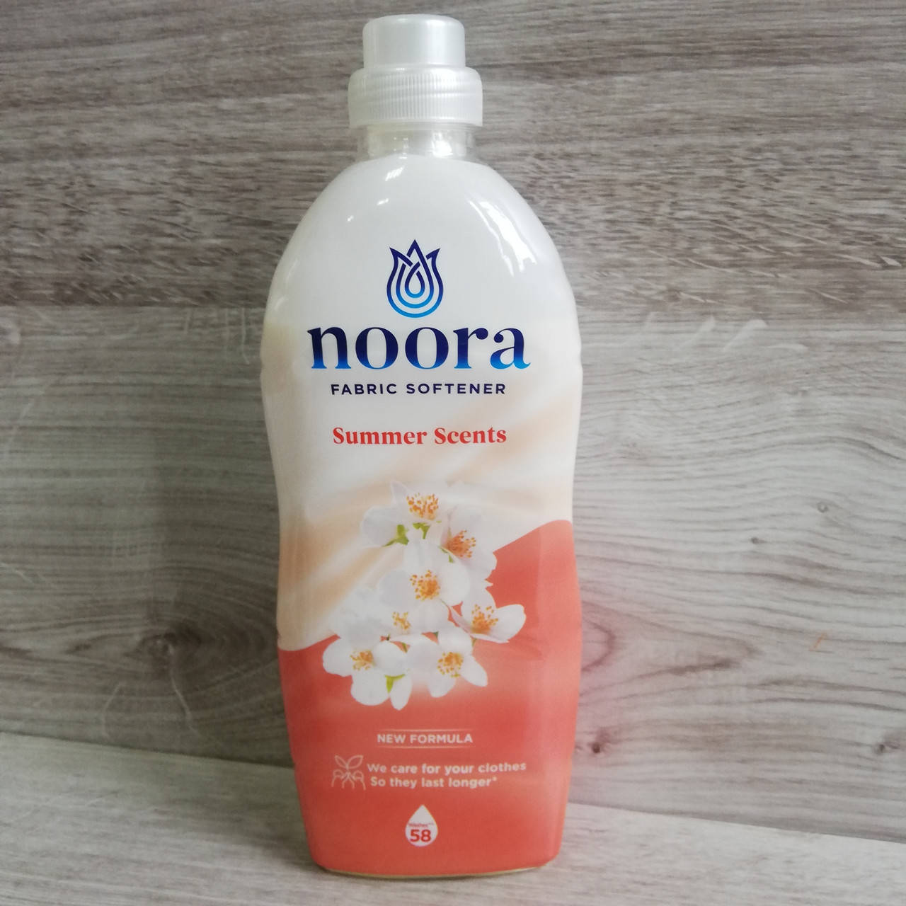 

Кондиционер для белья Noora Summer Scents Летний бриз, 928 мл (58 стирок)