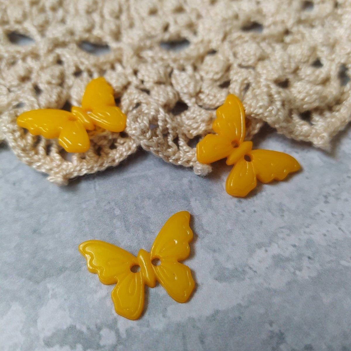 

Пуговичка метелик акриловий світло-оранжевий